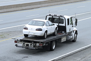 flat bed emergency towing service near me